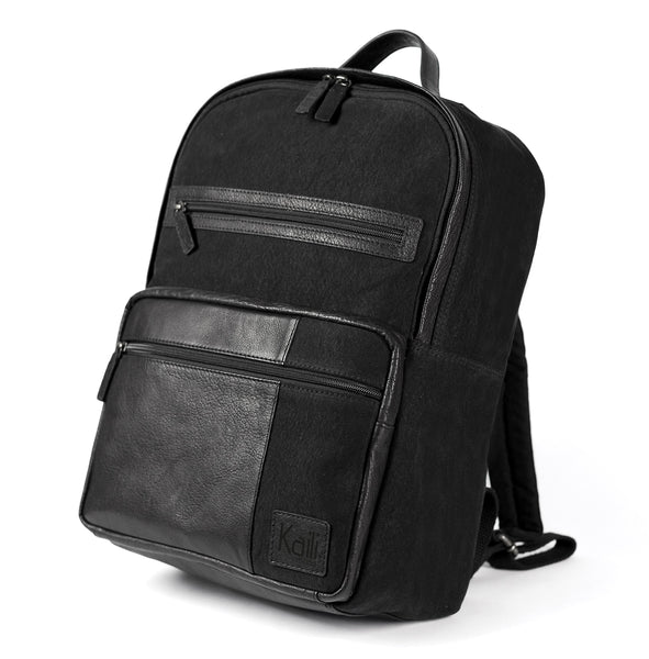 K0023AB | Canvas/Genuine Leather Laptop Backpack, Full Grain, Milled - Black. Antique Nickel Accessories, Zip Closure. Dimensions: 29 x 40 x 15 cm. Packaging: Non-woven Bag-0