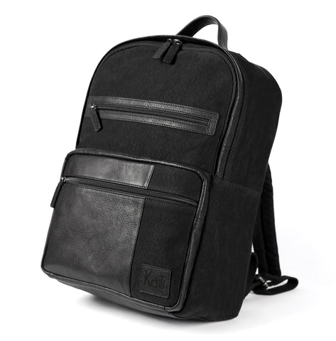 K0023AB | Canvas/Genuine Leather Laptop Backpack, Full Grain, Milled - Black. Antique Nickel Accessories, Zip Closure. Dimensions: 29 x 40 x 15 cm. Packaging: Non-woven Bag-0