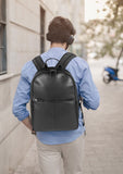 RB2001A | Nylon/Genuine Leather Netbook/Tablet Backpack with a light grain. Zipper closure and adjustable shoulder straps. Color: Black. Dimensions: 27 x 38 x 14 cm. Packaging: Non-woven fabric bag.-4